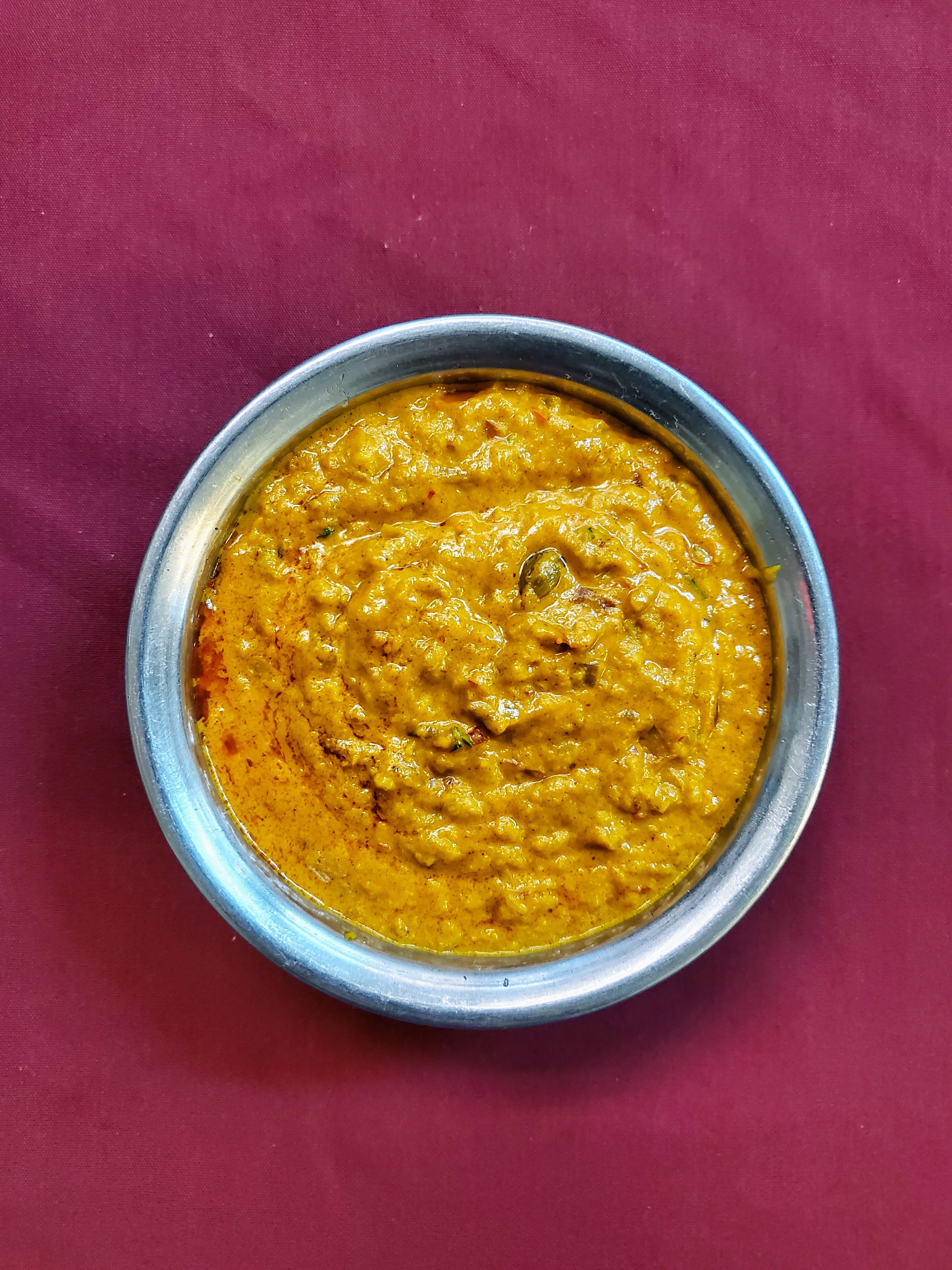 Baigan Bharata — Fresh eggplant roasted in the clay oven, mashed and blended with — at Himalayan Restaurant
