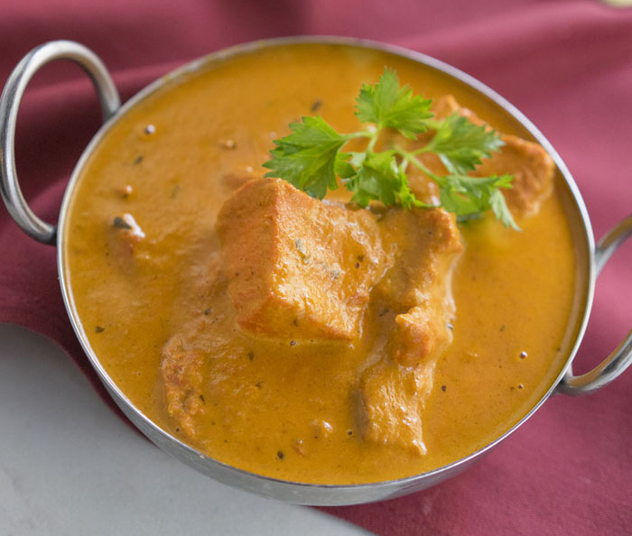 Chicken Tikka Masala — Handcrafted Premium marinated chicken grilled and sautéed in a — at Himalayan Restaurant