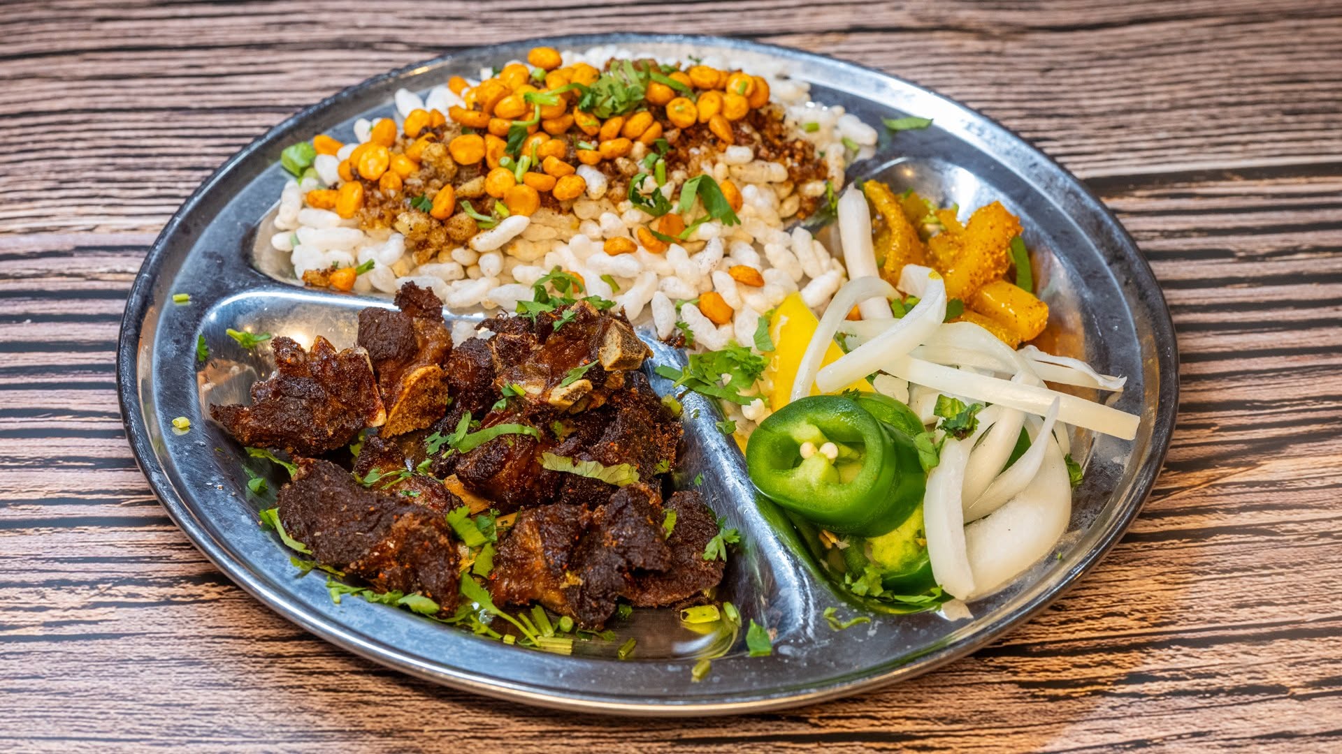 Goat Taas — A Handcrafted Premium Nepali specialty: tender goat dry-roasted in — at Himalayan Restaurant