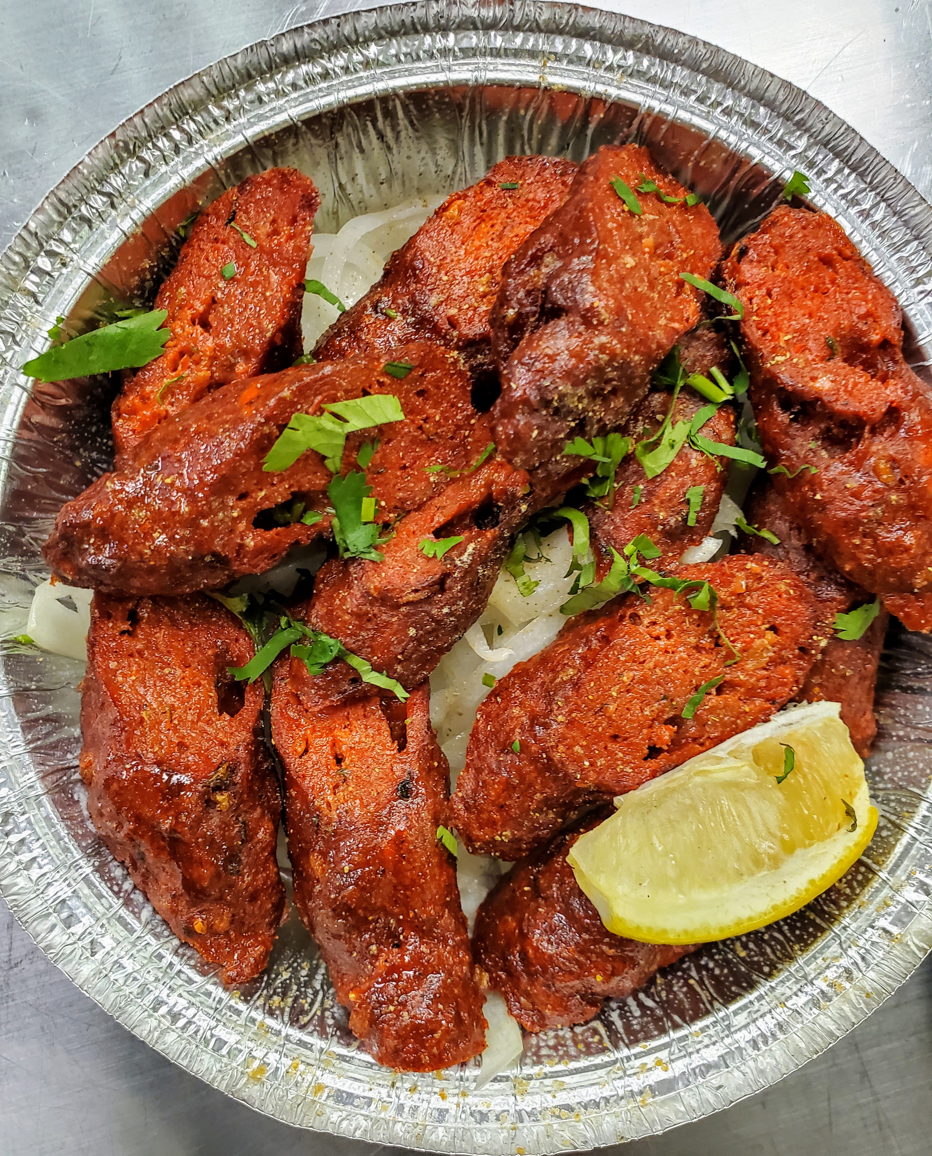 Lamb Sheesh Kabab — Handcrafted Premium minced lamb blended with herbs and spices — at Himalayan Restaurant