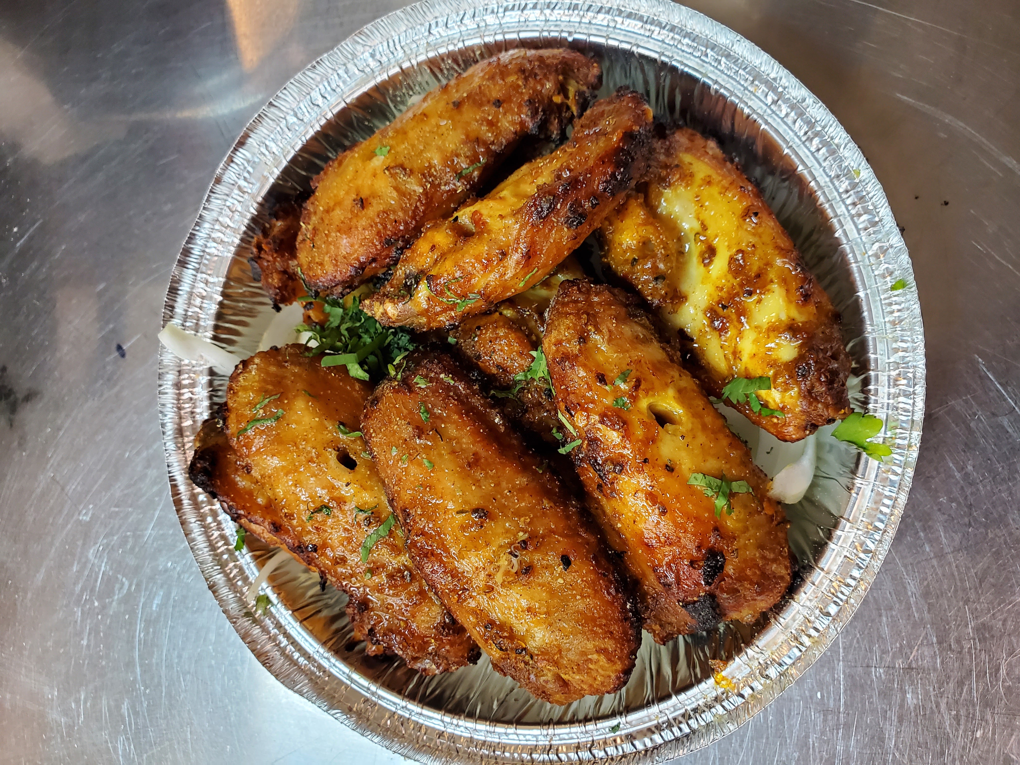 Masala Chicken Wings — Charbroiled chicken wings marinated in Himalayan spices and — at Himalayan Restaurant