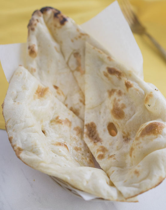 Naan — Traditional Indian flatbread, no egg, at Himalayan Restaurant