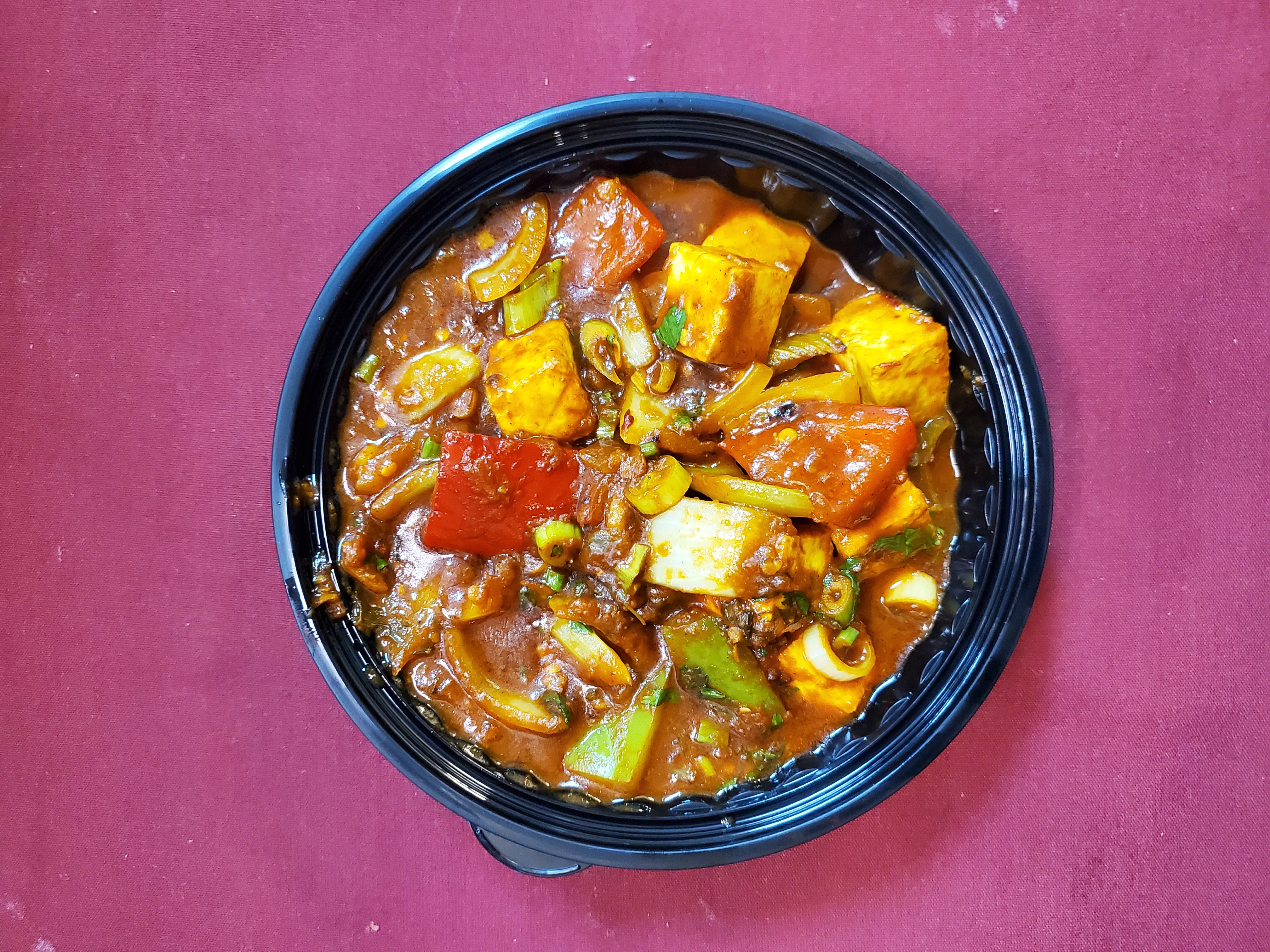 Paneer Chili Masala — Stir-fried paneer sautéed with different chilies, cooked in spices — at Himalayan Restaurant
