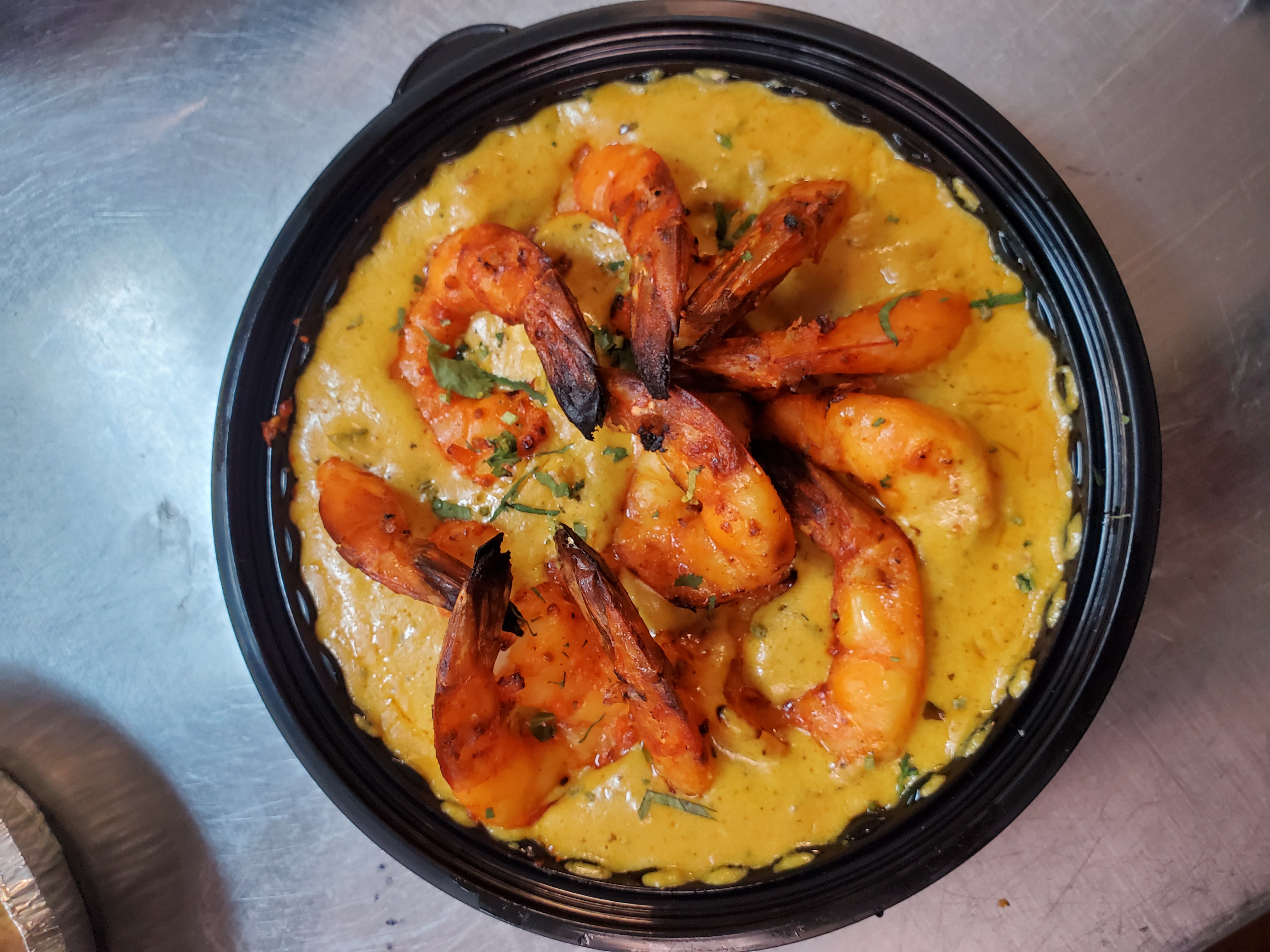 Tandoori Shrimp Masala — Jumbo shrimp roasted in the clay oven and cooked in a special — at Himalayan Restaurant